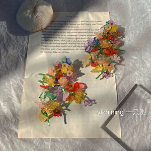 H3LL NO  exaggerated flower acrylic beaded woven earrings